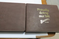 Изготовление книги А-3 для рекламы из кожи с тиснением